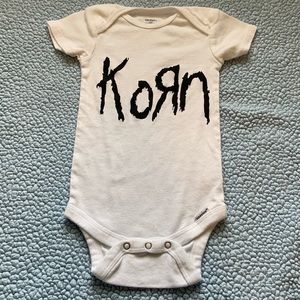 Korn baby onesie